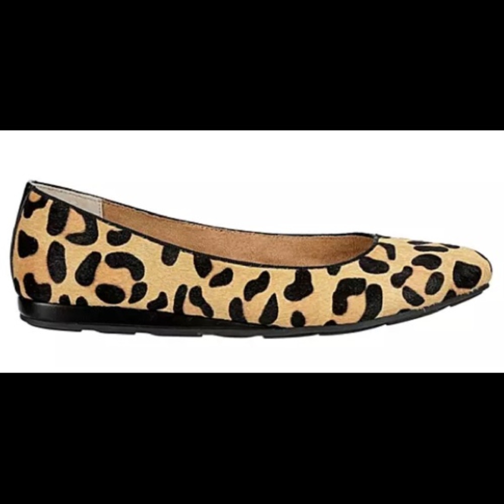Flat animal print shoes.
